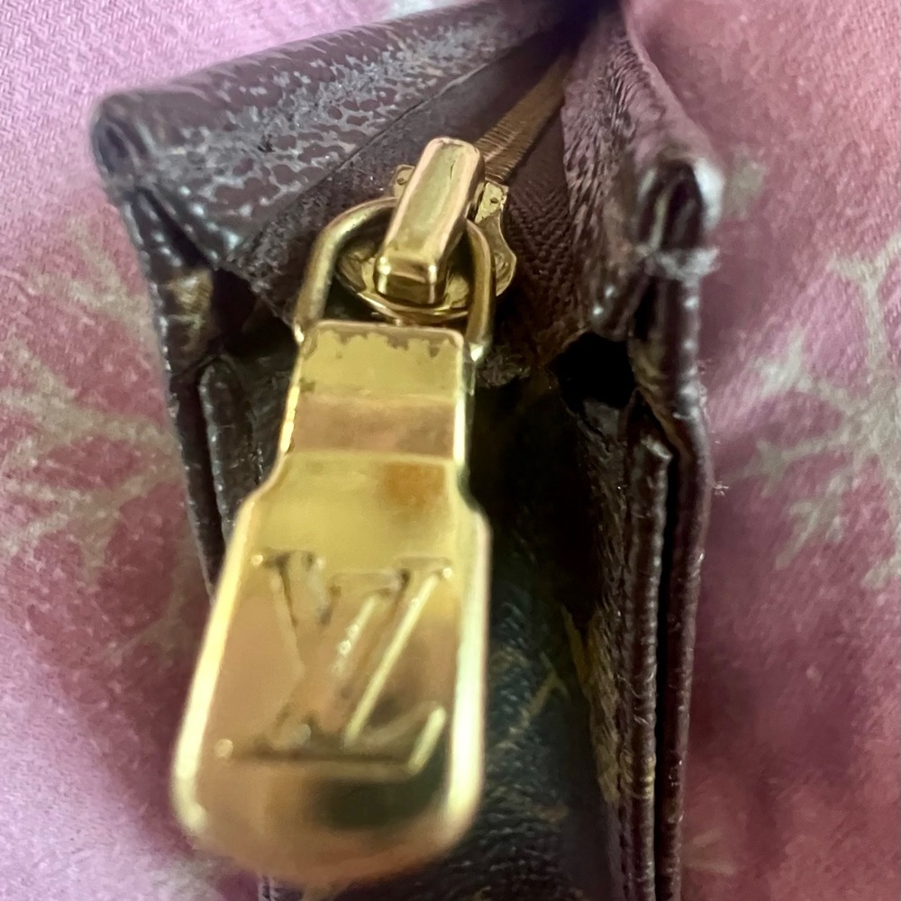 Vintage Louis Vuitton makeup bag. 5.6 width.. height 4 inches depth 3.5